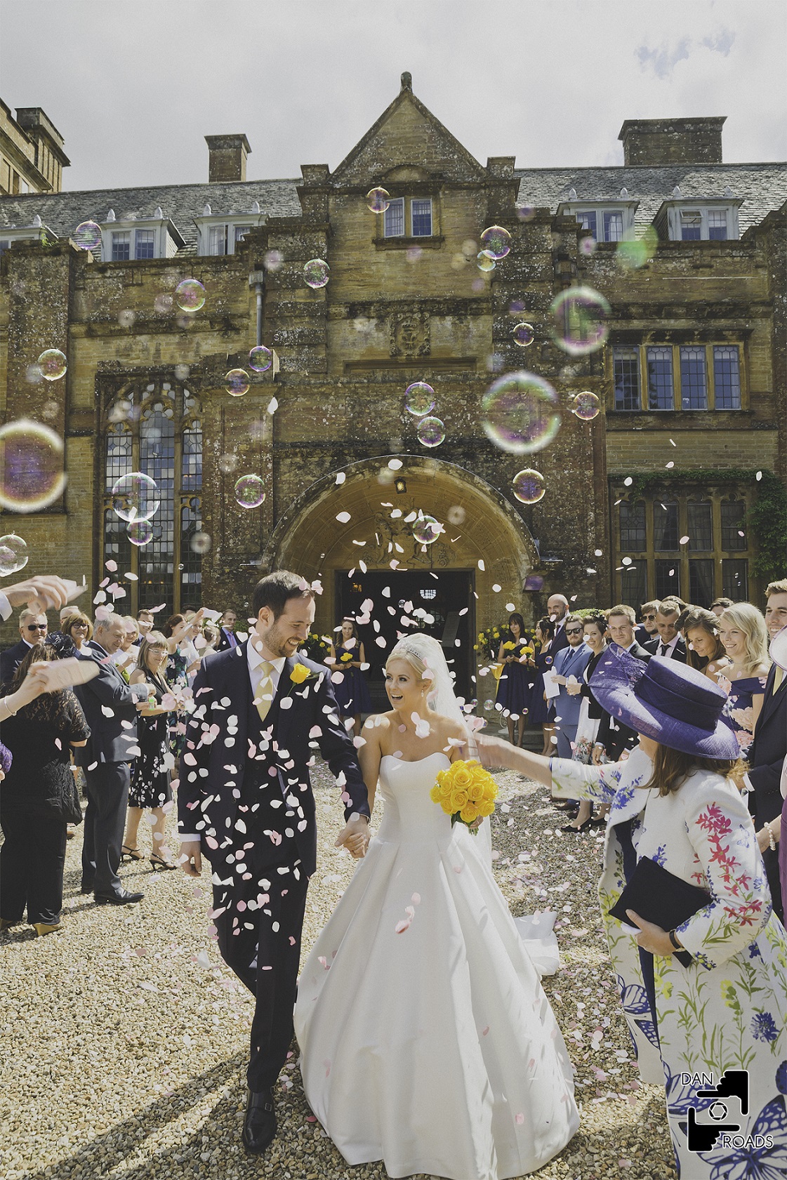 Minterne House wedding couple and bubbles