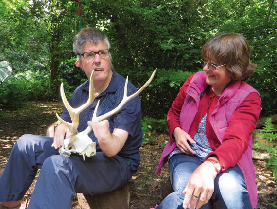 Volunteer Alex and a deer skull