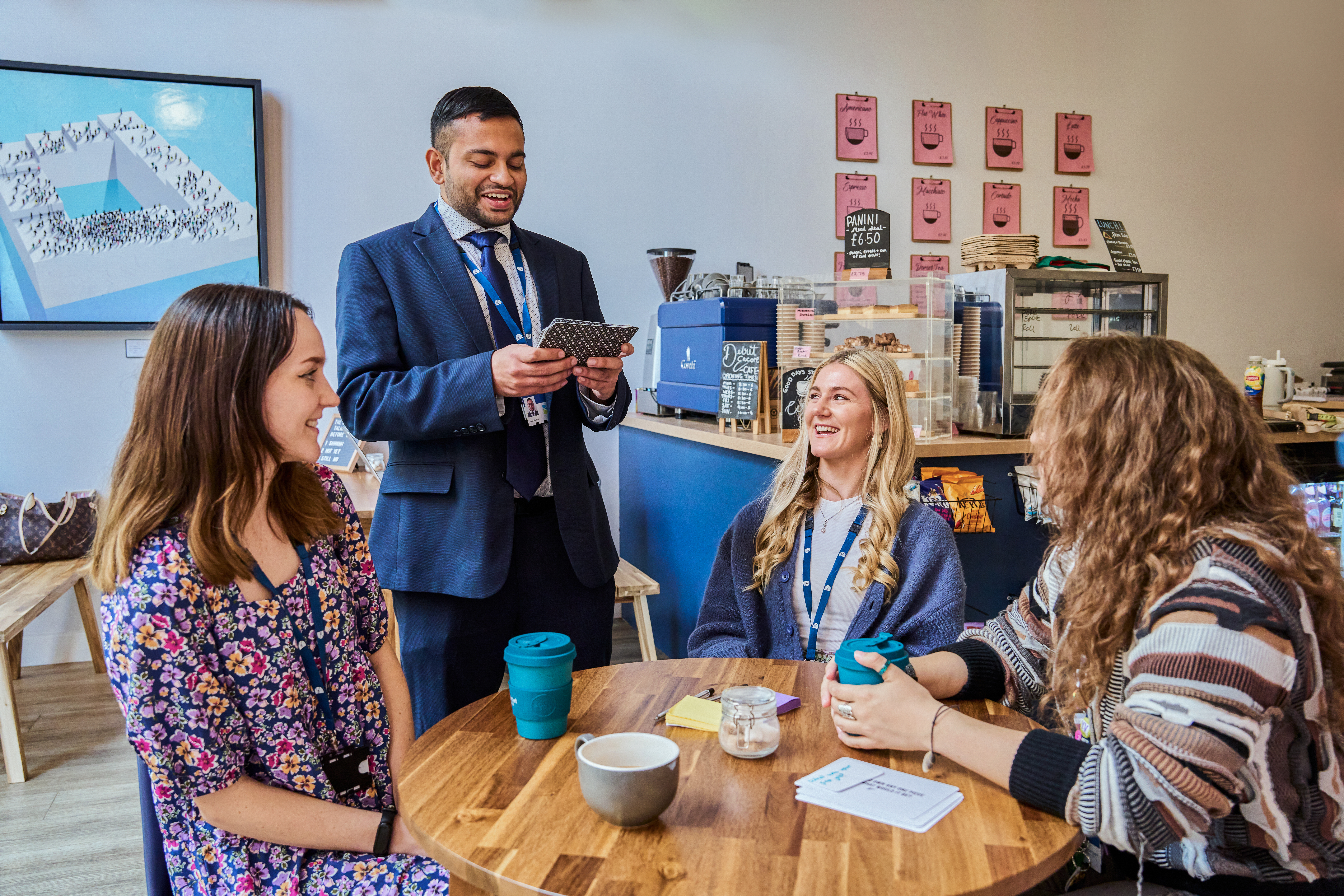 Image of a group of people at a cafe